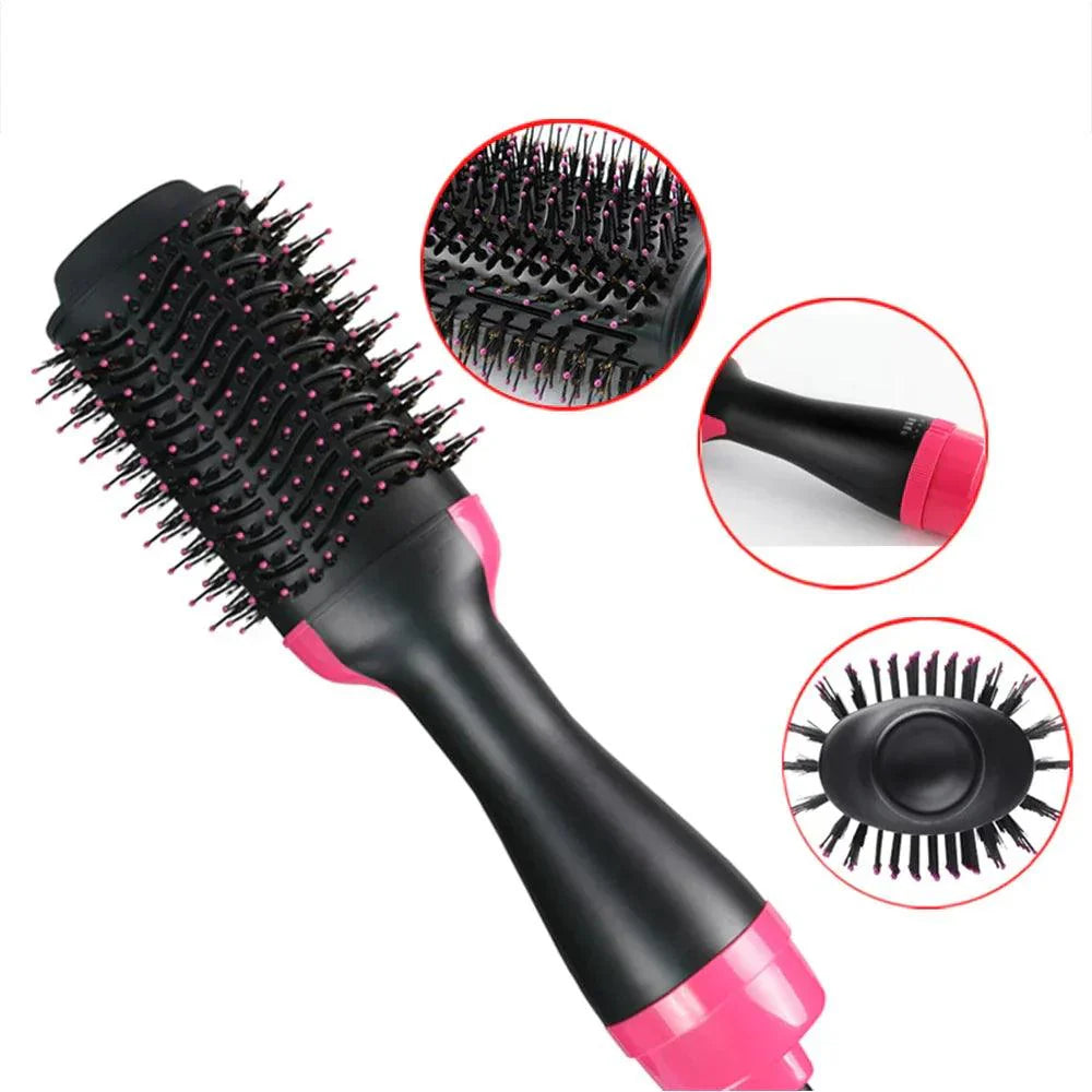 woman styling hair with ceramic hot air brush at home