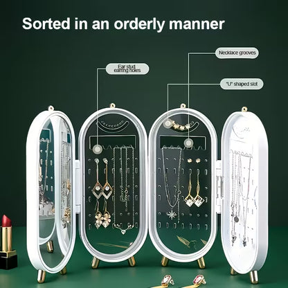 Jewelry organizer with various necklaces and earrings on a green background
