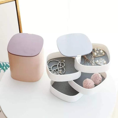 Jewelry organizer with compartments on a white surface