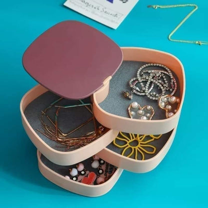 Jewelry organizer with jewelry on a blue background
