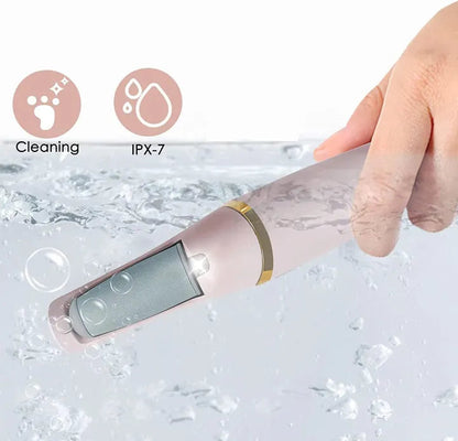 Hand holding a cleaning tool with water droplets and icons indicating cleaning and IPX-7 rating.