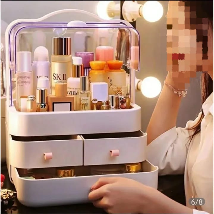 Woman using a makeup organizer filled with various skincare and cosmetic products.