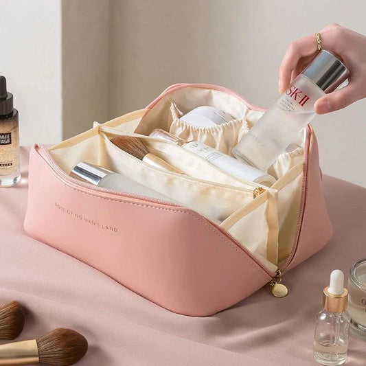 multiple compartments inside leather makeup organizer bag